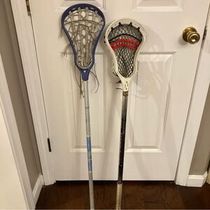 2 used Lacrosse Sticks with Blue and White Heads
